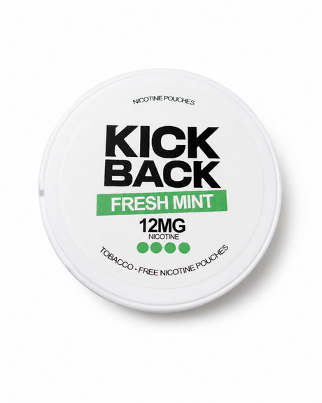 Round container labeled 'Kick Back Fresh Mint' with nicotine information on a white background